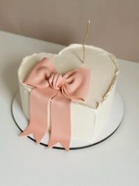 heart shaped cake with ribbon