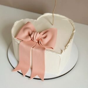 heart shaped cake with ribbon